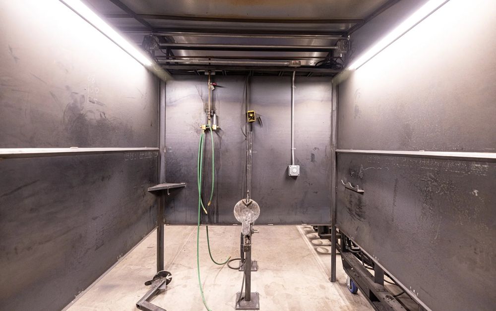 Inside a welding booth at Western Welding Academy